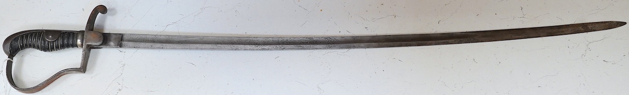 A Prussian artillery sword, etched blade, regulation hilt, blade 81cm. Condition - fair, well worn